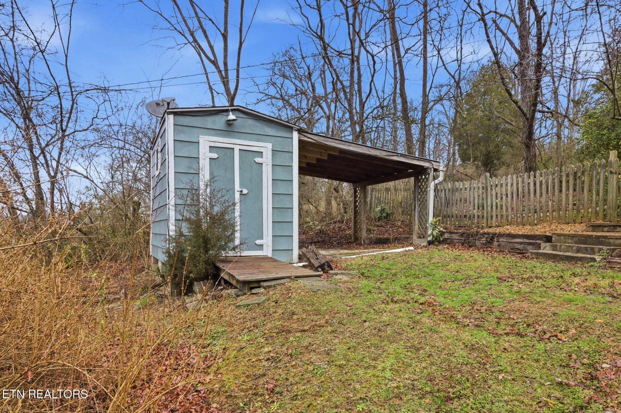 353 East Wolf Valley Road Heiskell, TN 37754 - Photo 33 of 34 a front view of a house with a yard