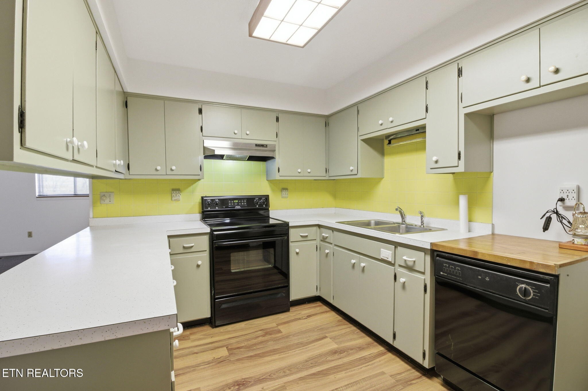 353 East Wolf Valley Road Heiskell, TN 37754 - Photo 7 of 34 a kitchen with a sink appliances and cabinets