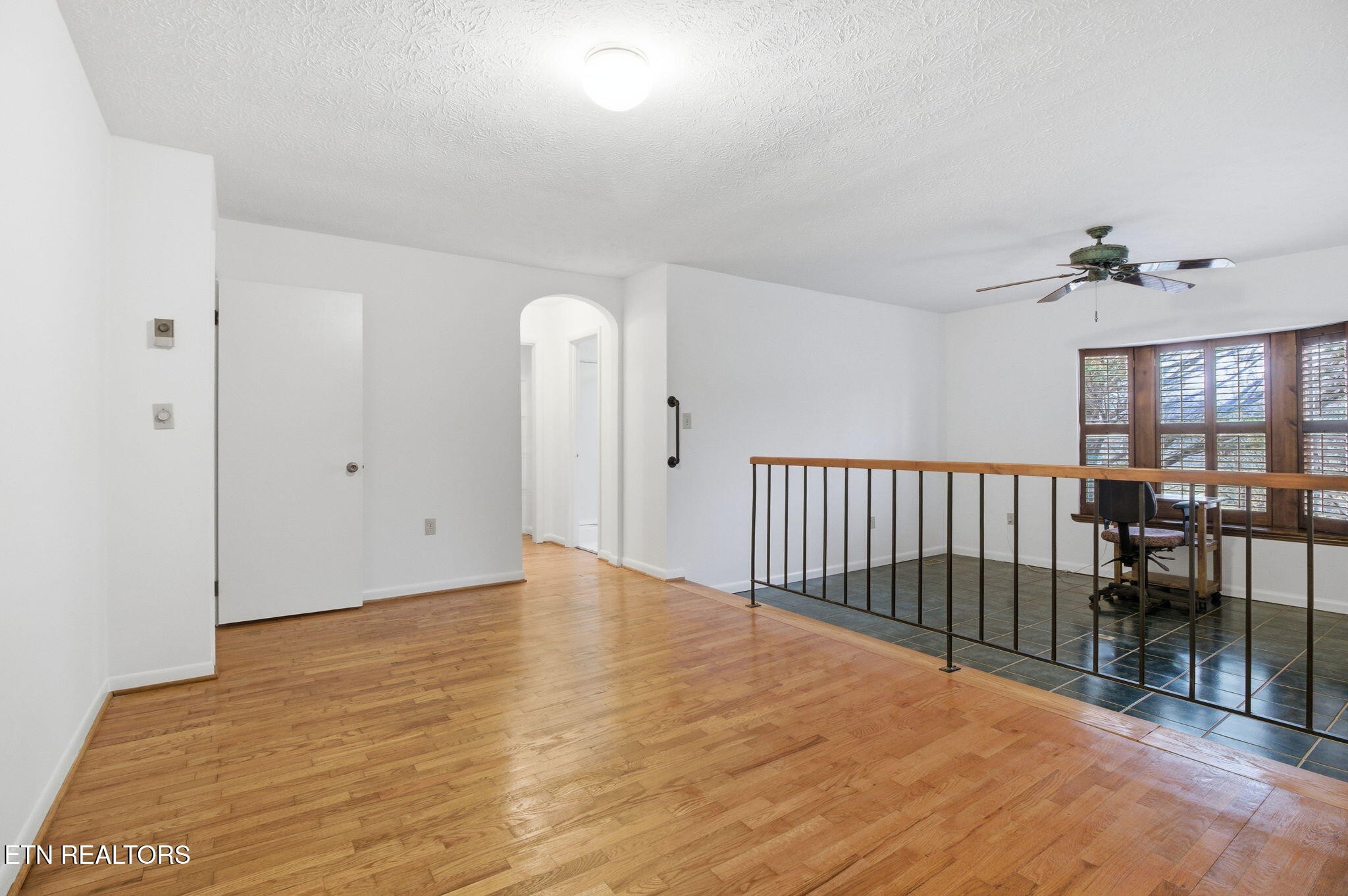 353 East Wolf Valley Road Heiskell, TN 37754 - Photo 10 of 34 a view of a room with wooden floor