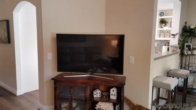 a room with a table and chairs