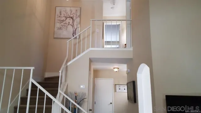 a view of a hallway with entryway