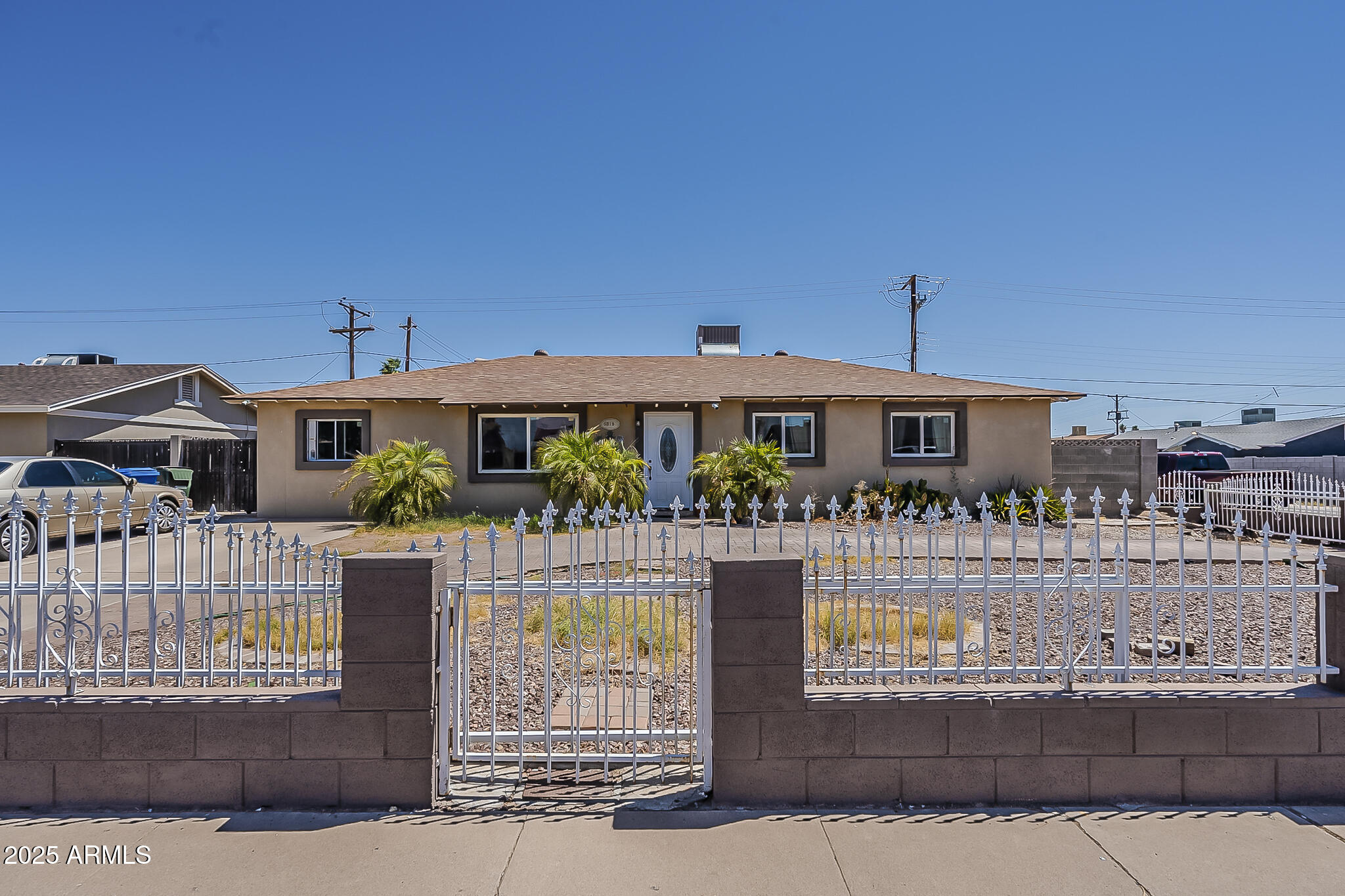 a front view of a house with swimming pool