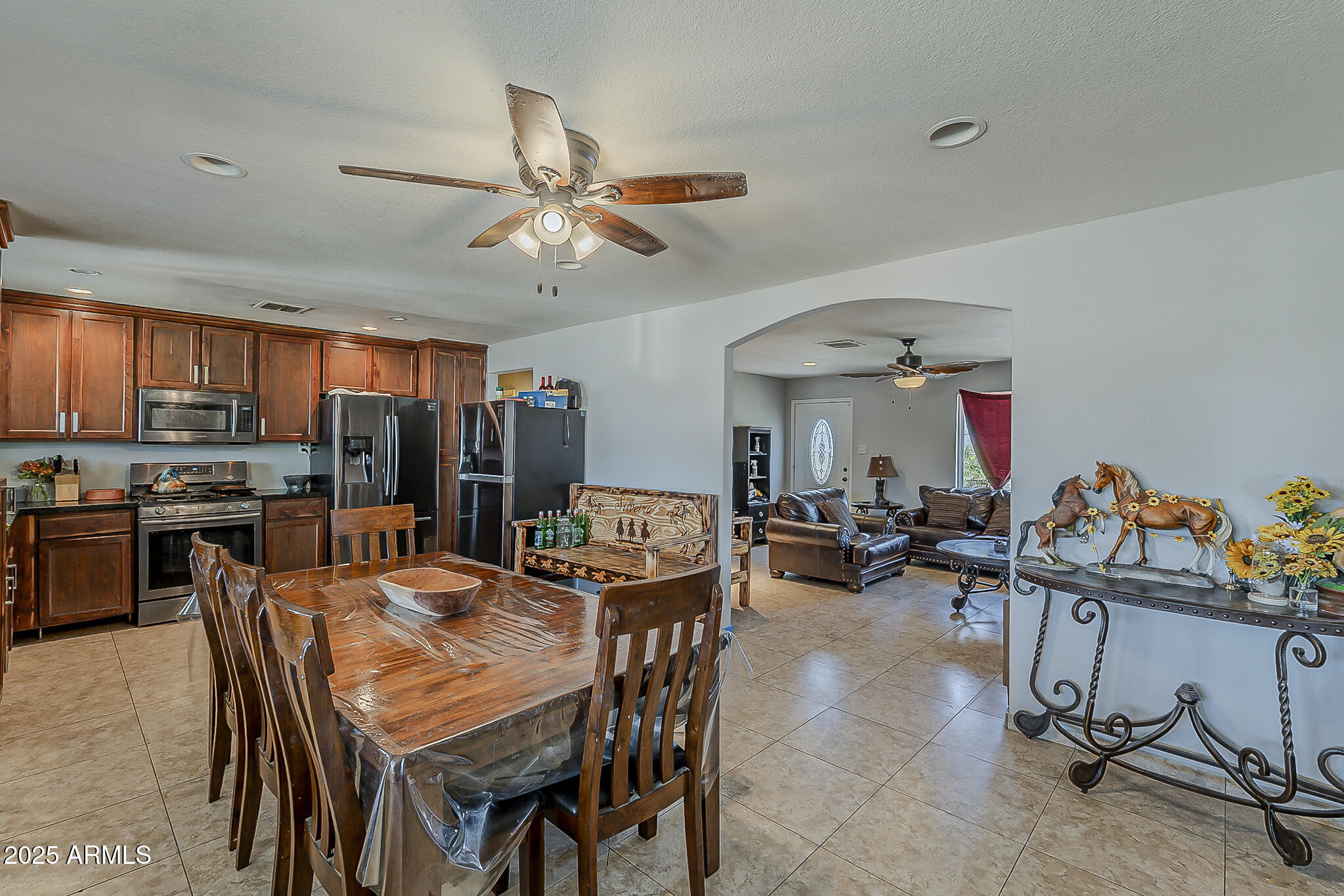 5319 West Osborn Road Phoenix, AZ 85031 - Photo 11 of 37 a view of a dining room with furniture window and outside view