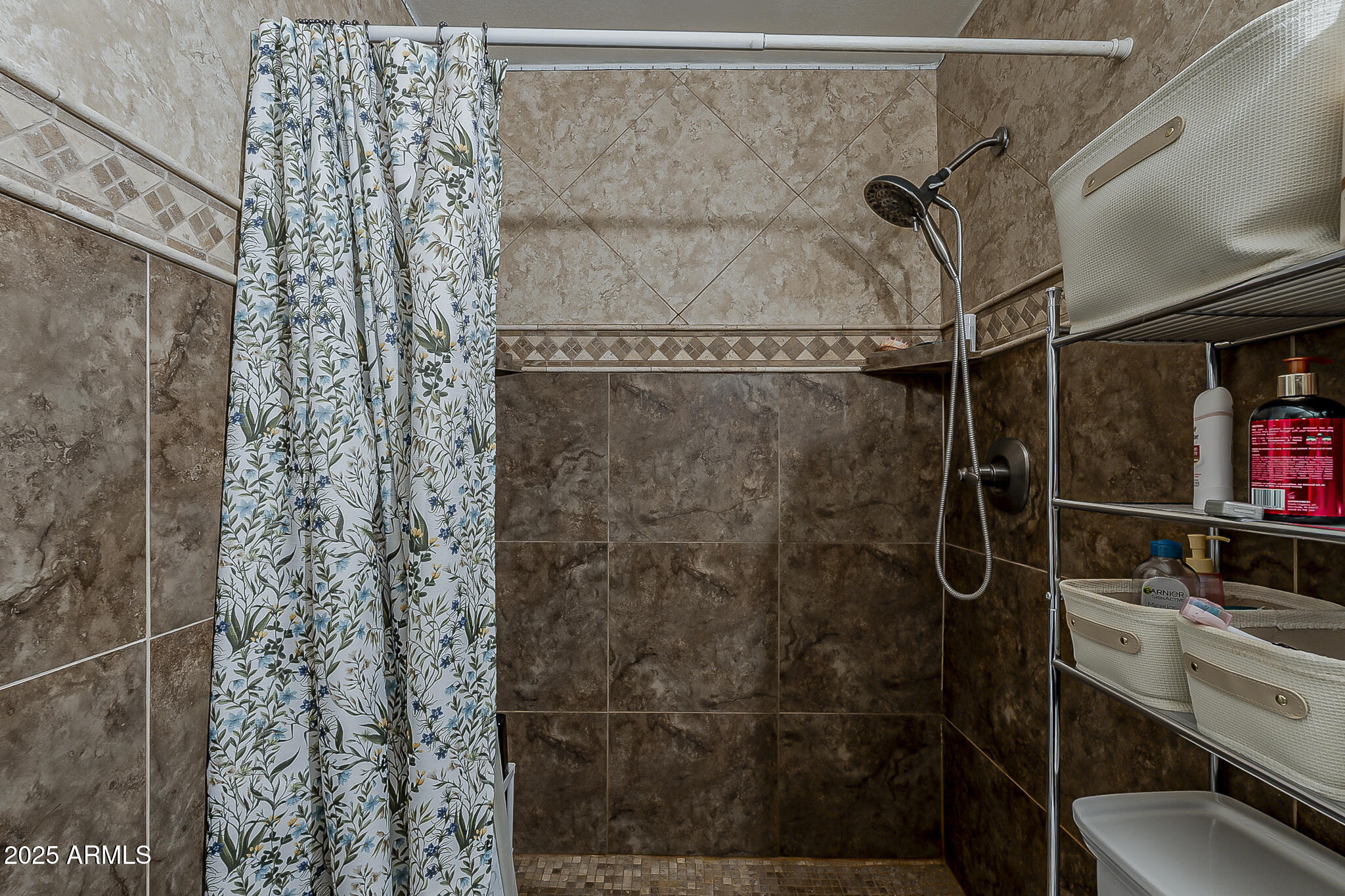 5319 West Osborn Road Phoenix, AZ 85031 - Photo 28 of 37 a bathroom with a shower and a sink