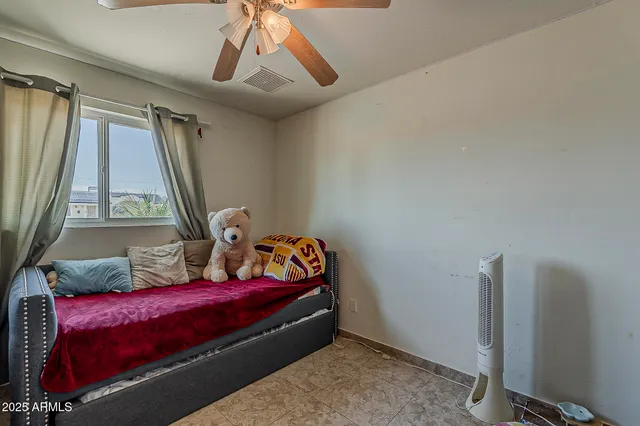 a view of a storage & utility room with washer and dryer