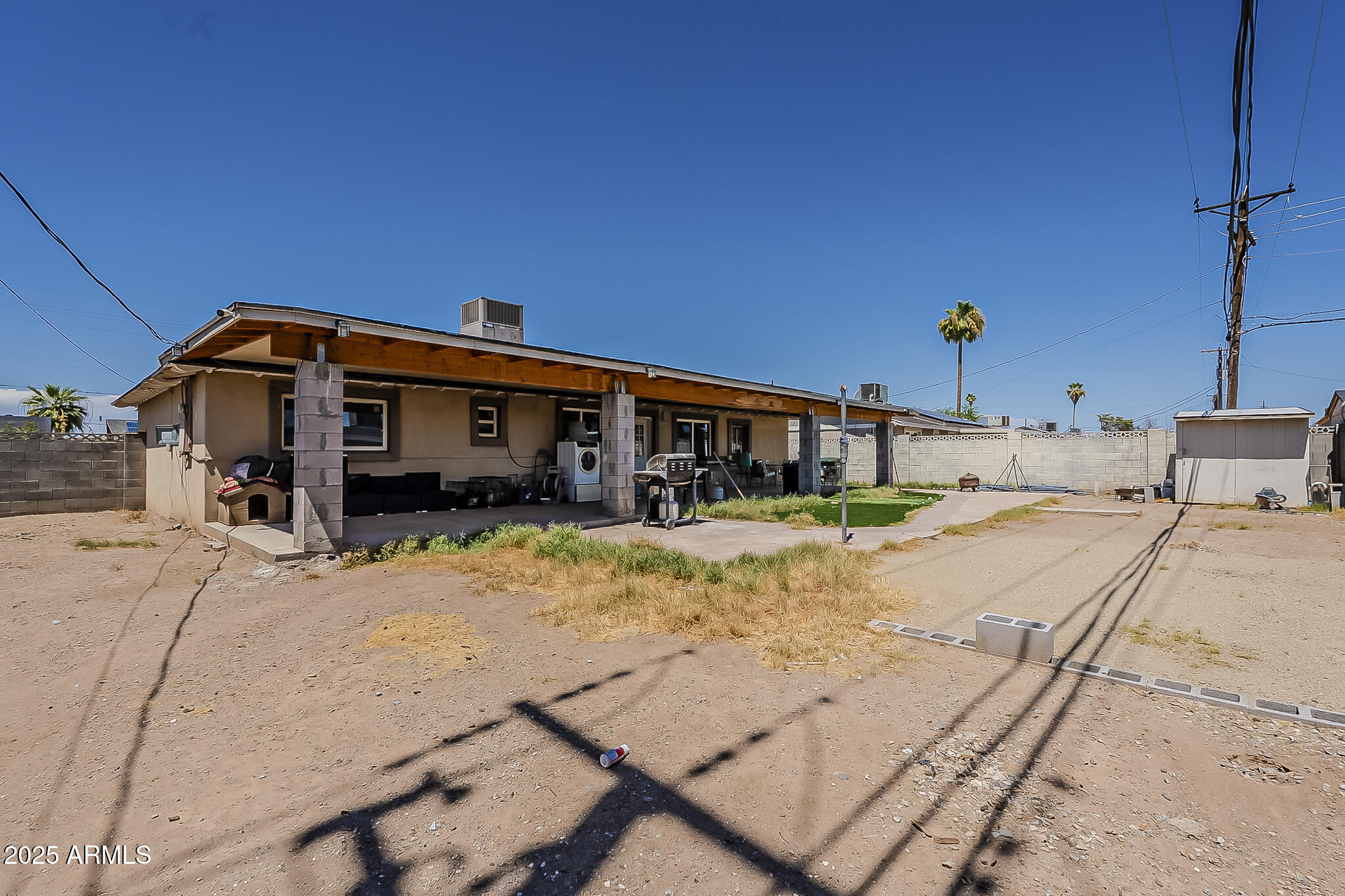 5319 West Osborn Road Phoenix, AZ 85031 - Photo 33 of 37 a view of a house with snow on the road