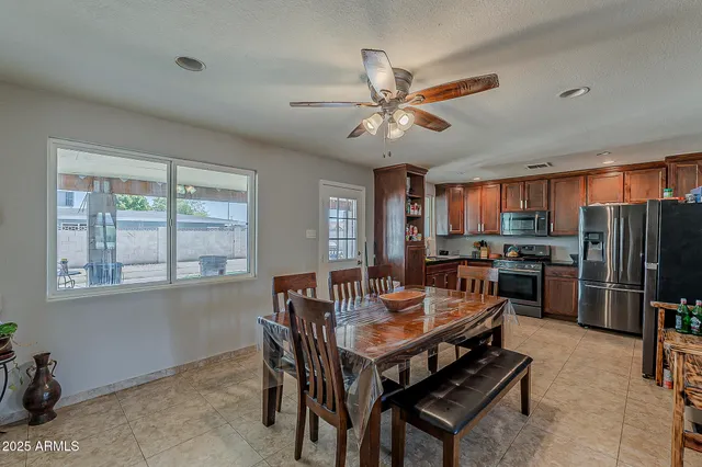 a view of a dining room with furniture