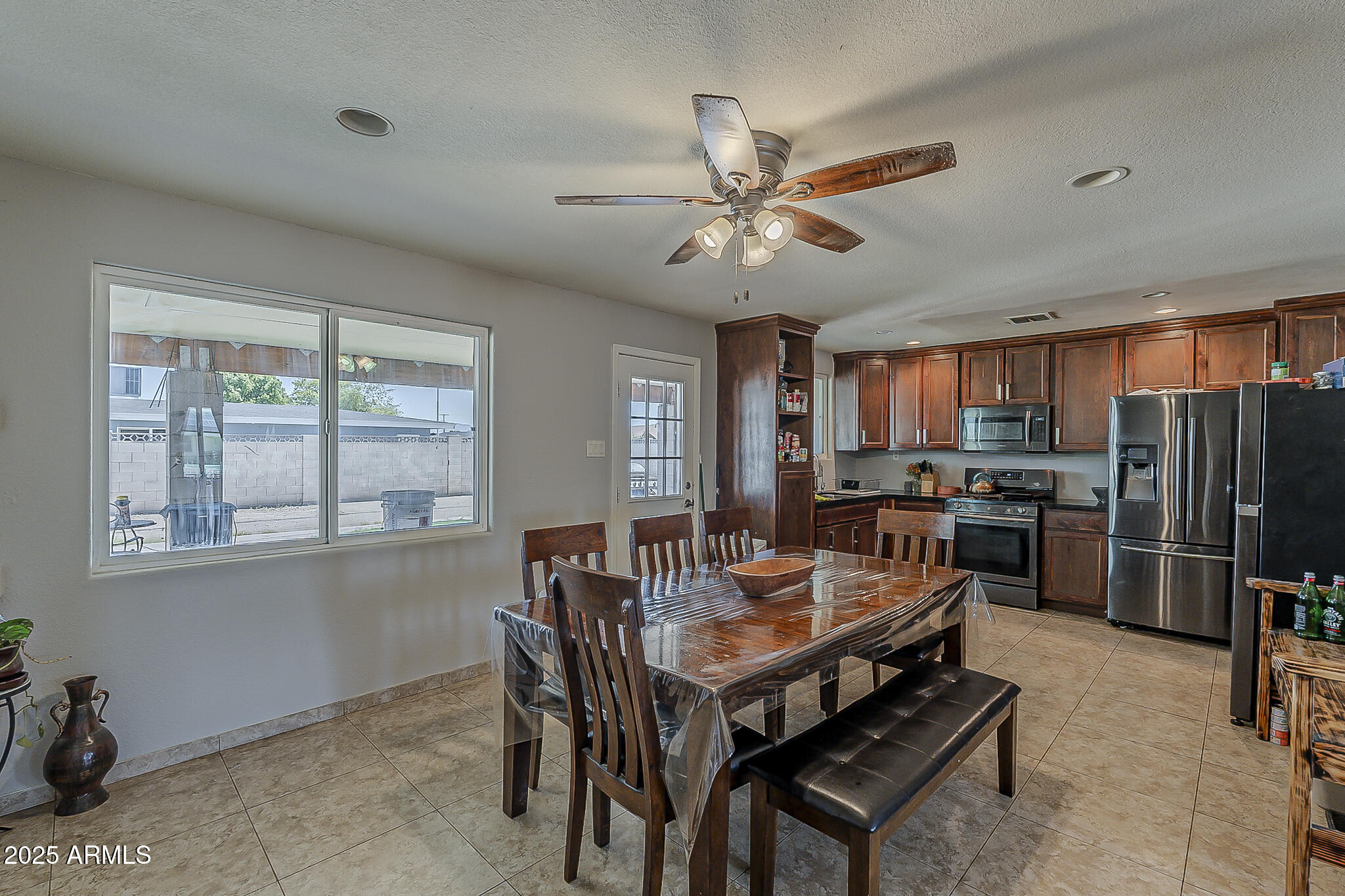 5319 West Osborn Road Phoenix, AZ 85031 - Photo 10 of 37 a view of a dining room with furniture