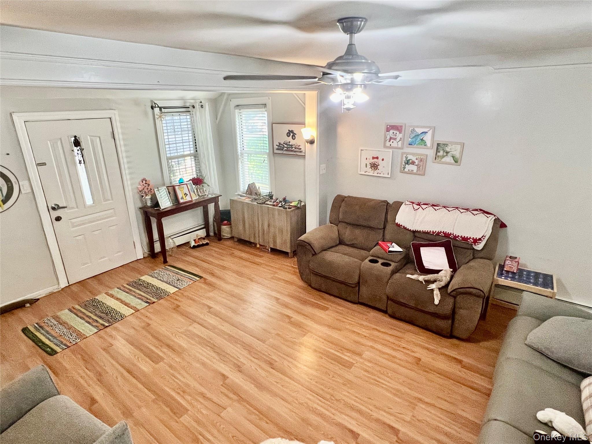 a living room with furniture and a table