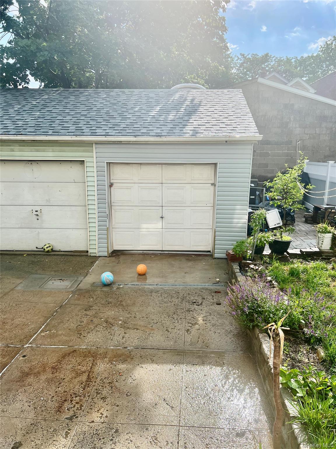 22-26 74th Street Queens, NY 11370 - Photo 14 of 19 a view of a backyard