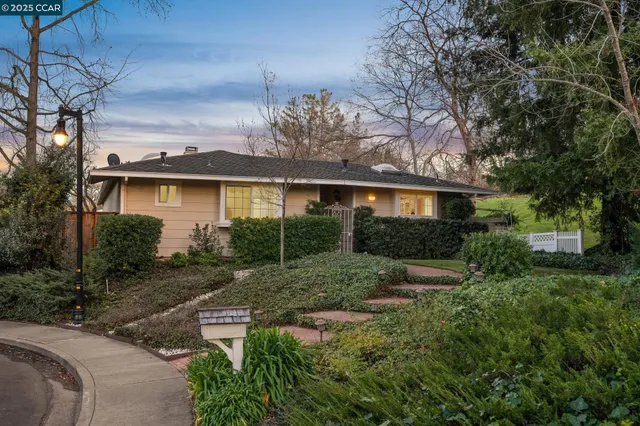a view of house with outdoor space