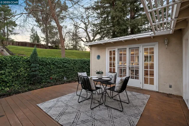 a bedroom with a large bed and a large window