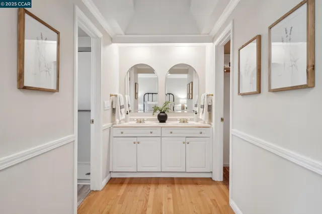 a bedroom with a bed and a lamp