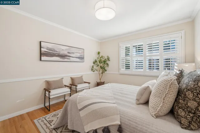 a view of a storage and utility room with washer and dryer