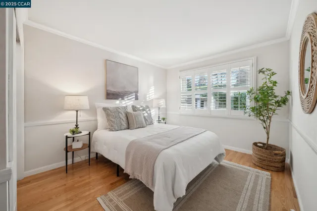 a view of empty room with white walls