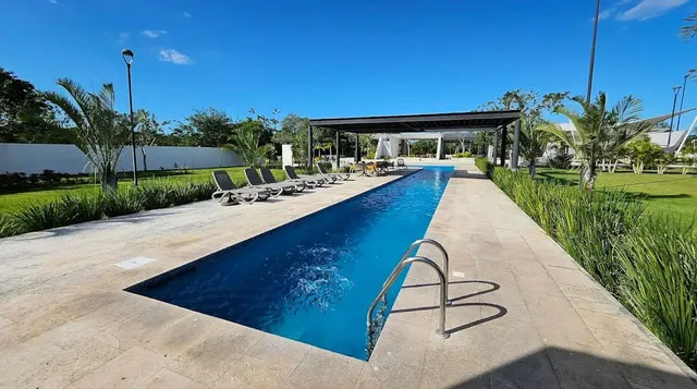 a view of swimming pool with a patio
