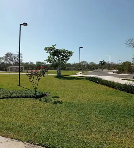 a view of a lake with a big yard
