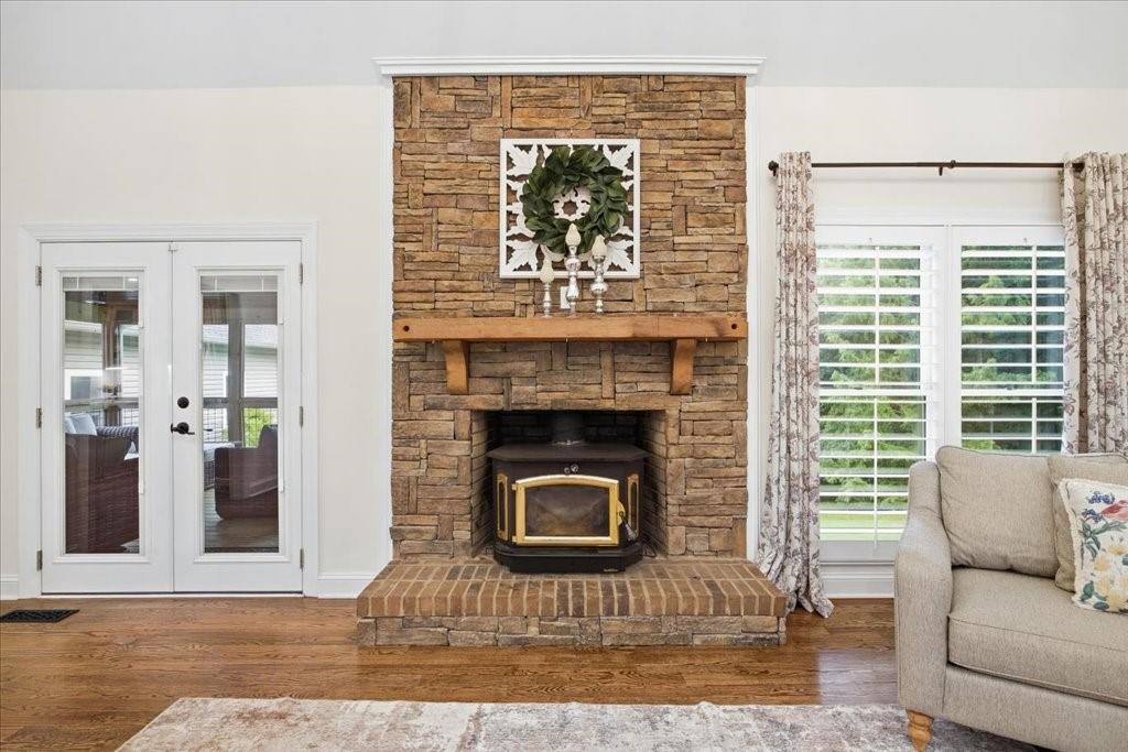 397 Thomas Road Dallas, GA 30132 - Photo 18 of 108 a living room with furniture and a fireplace
