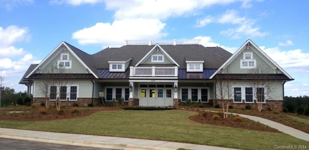 79184 Ridgehaven Road, Unit 295 Lancaster, SC 29720 - Photo 14 of 19 a front view of a house with garden