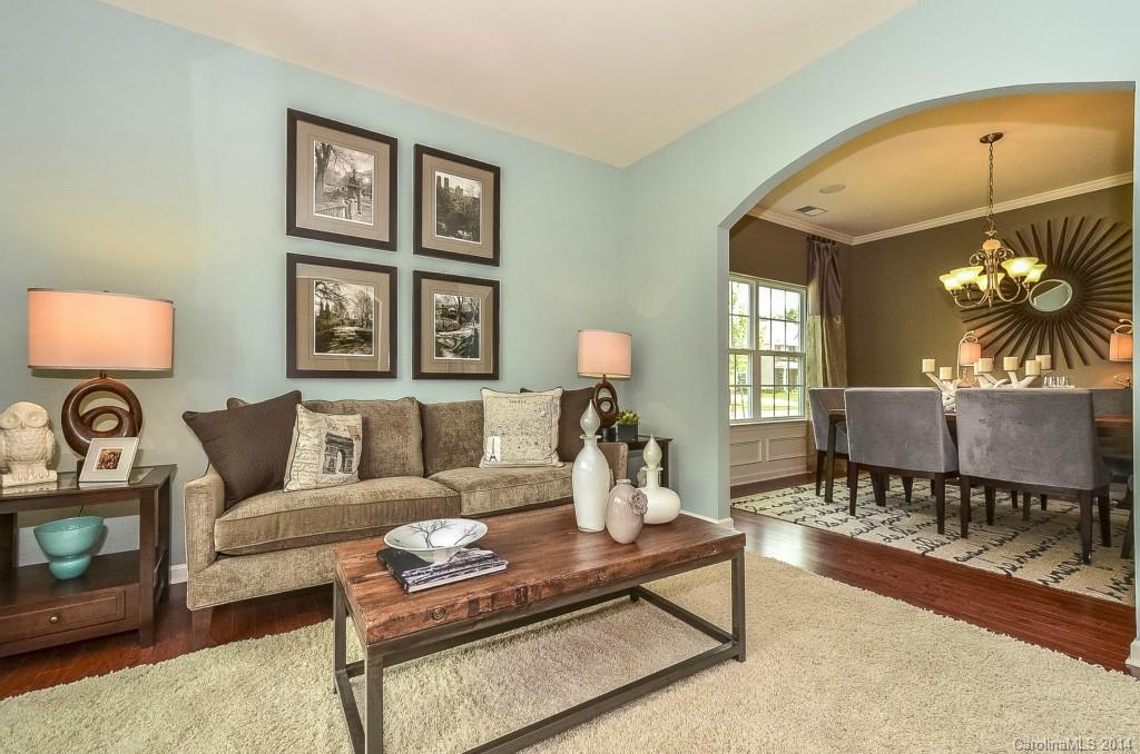 79184 Ridgehaven Road, Unit 295 Lancaster, SC 29720 - Photo 10 of 19 a living room with furniture and wooden floor