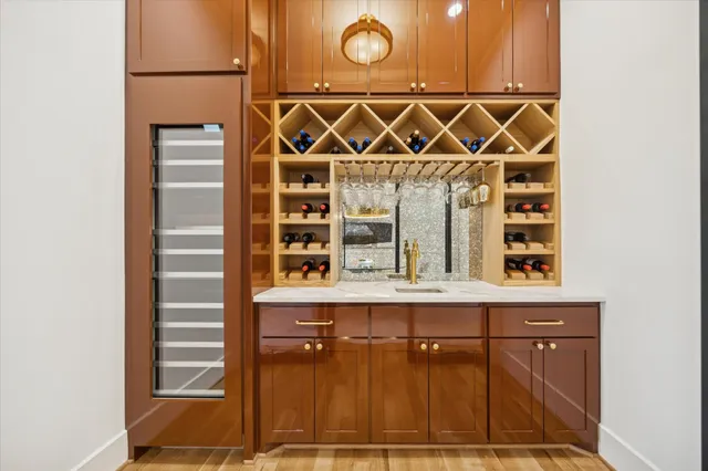 a bathroom with a door and a shower