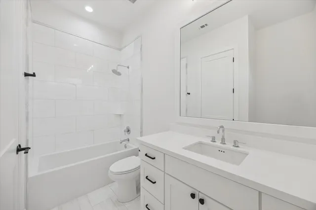 a room with white cabinets