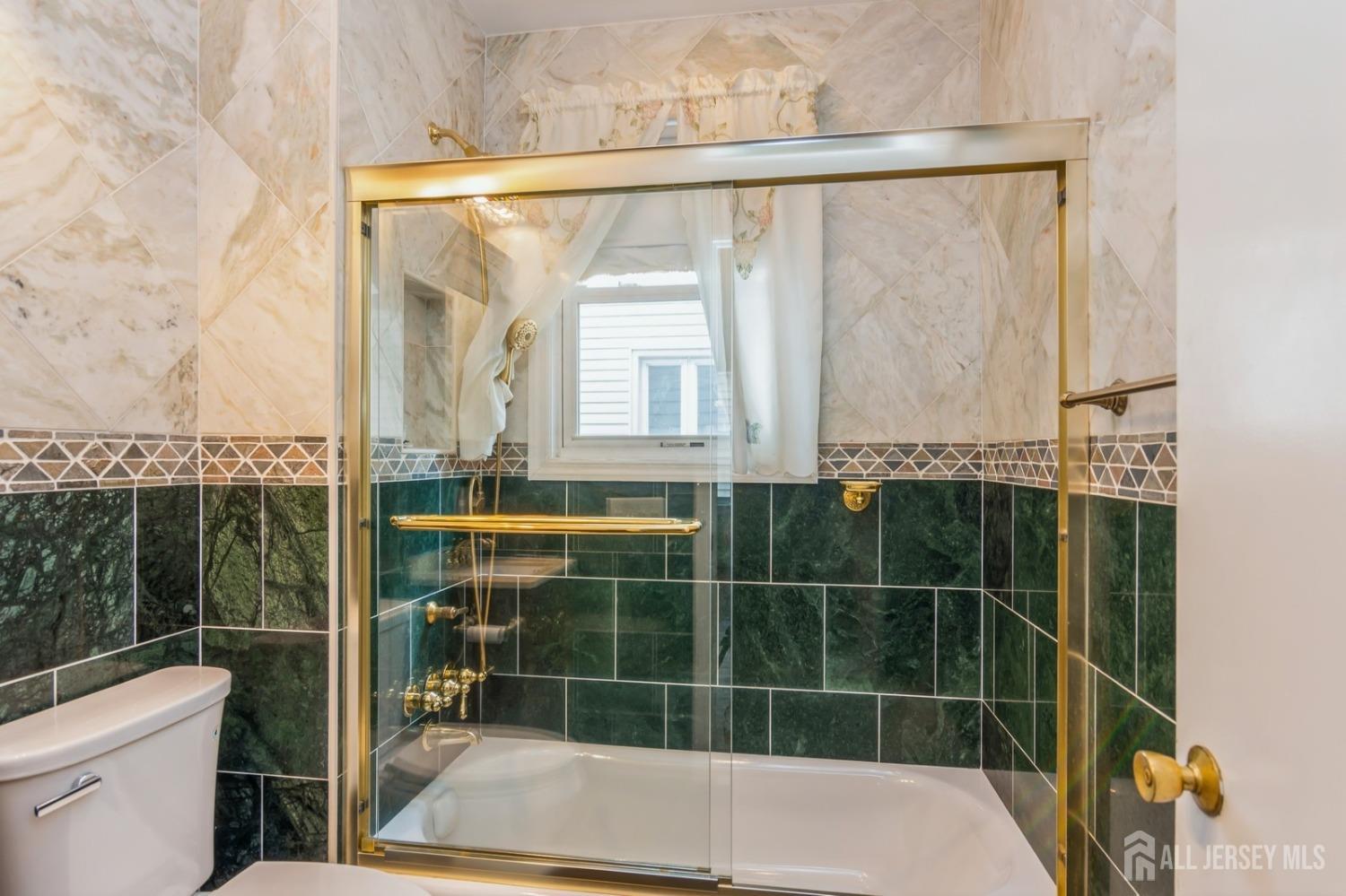 83 South Maple Avenue Springfield, NJ 07081 - Photo 15 of 38 a bathroom with a shower