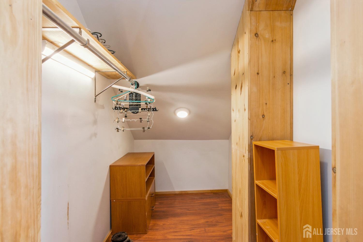 83 South Maple Avenue Springfield, NJ 07081 - Photo 18 of 38 a very nice looking room with a mirror