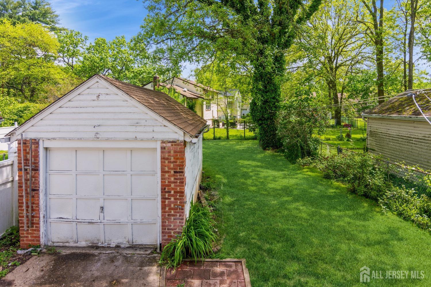 83 South Maple Avenue Springfield, NJ 07081 - Photo 33 of 38 a house view with a backyard space