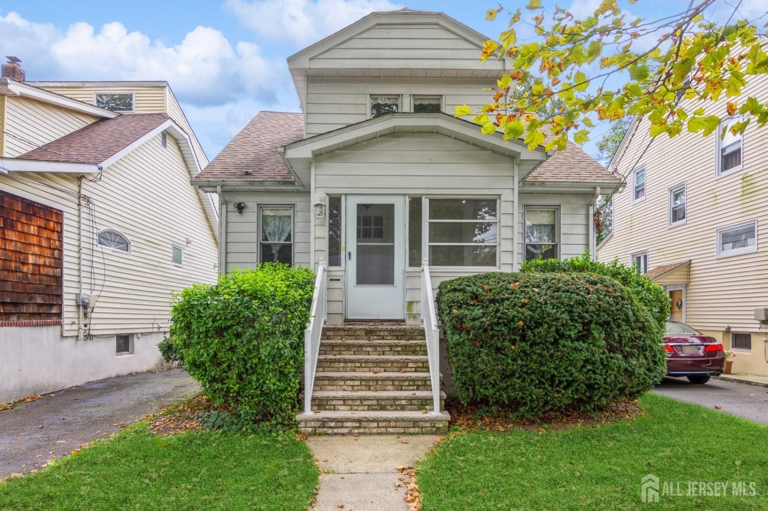 83 South Maple Avenue Springfield, NJ 07081 - Photo 34 of 38 a front view of a house with garden