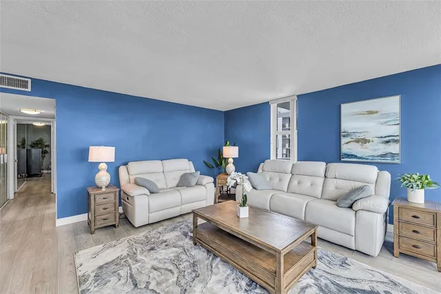 a living room with furniture and a couch