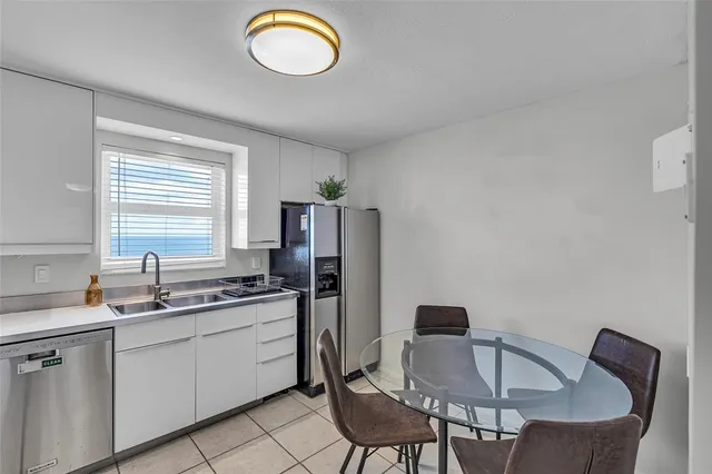 a view of hallway with wooden floor