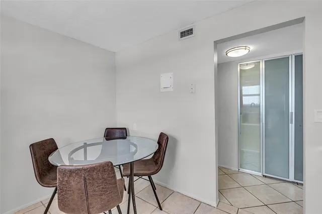 a bedroom with double bed and a window