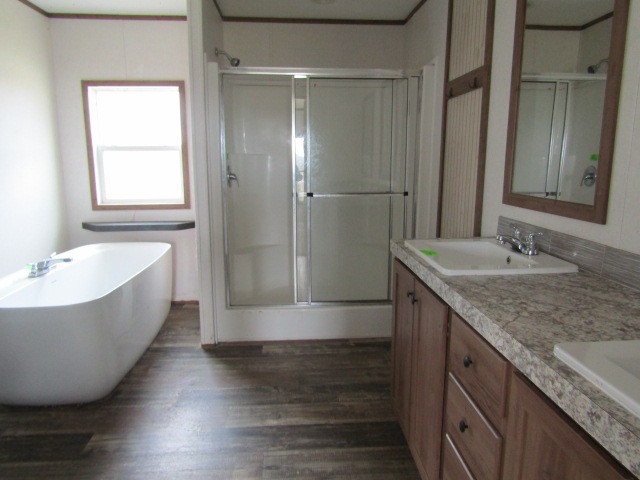 9578 Sunrise Road Red Boiling Springs, TN 37150 - Photo 11 of 19 a bathroom with a granite countertop bathtub sink vanity and mirror