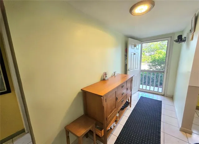 a room with a bed and a window