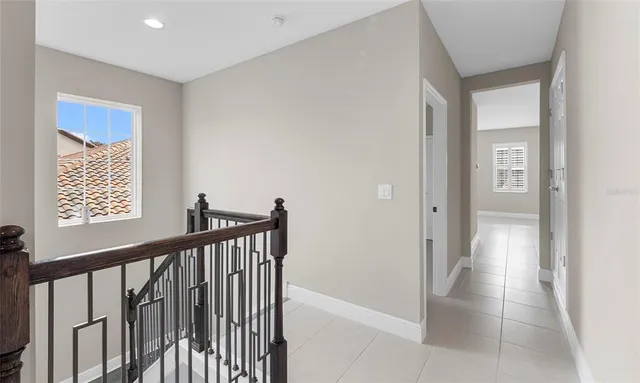 a bathroom with a sink toilet and mirror