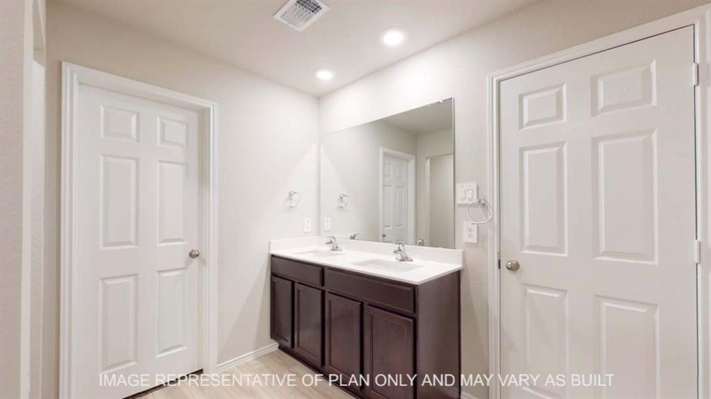 10212 Neptune Court Waco, TX 76708 - Photo 13 of 22 Full bathroom with double vanity