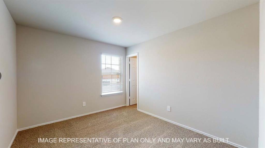 10212 Neptune Court Waco, TX 76708 - Photo 14 of 22 Empty room with light carpet and baseboards