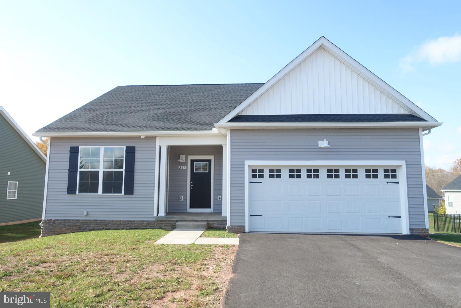 201 Kinneman Road, Unit 25 Abbottstown, PA 17301 - Photo 1 of 32 a house with a outdoor space