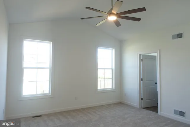 a view of a room with racks on the wall