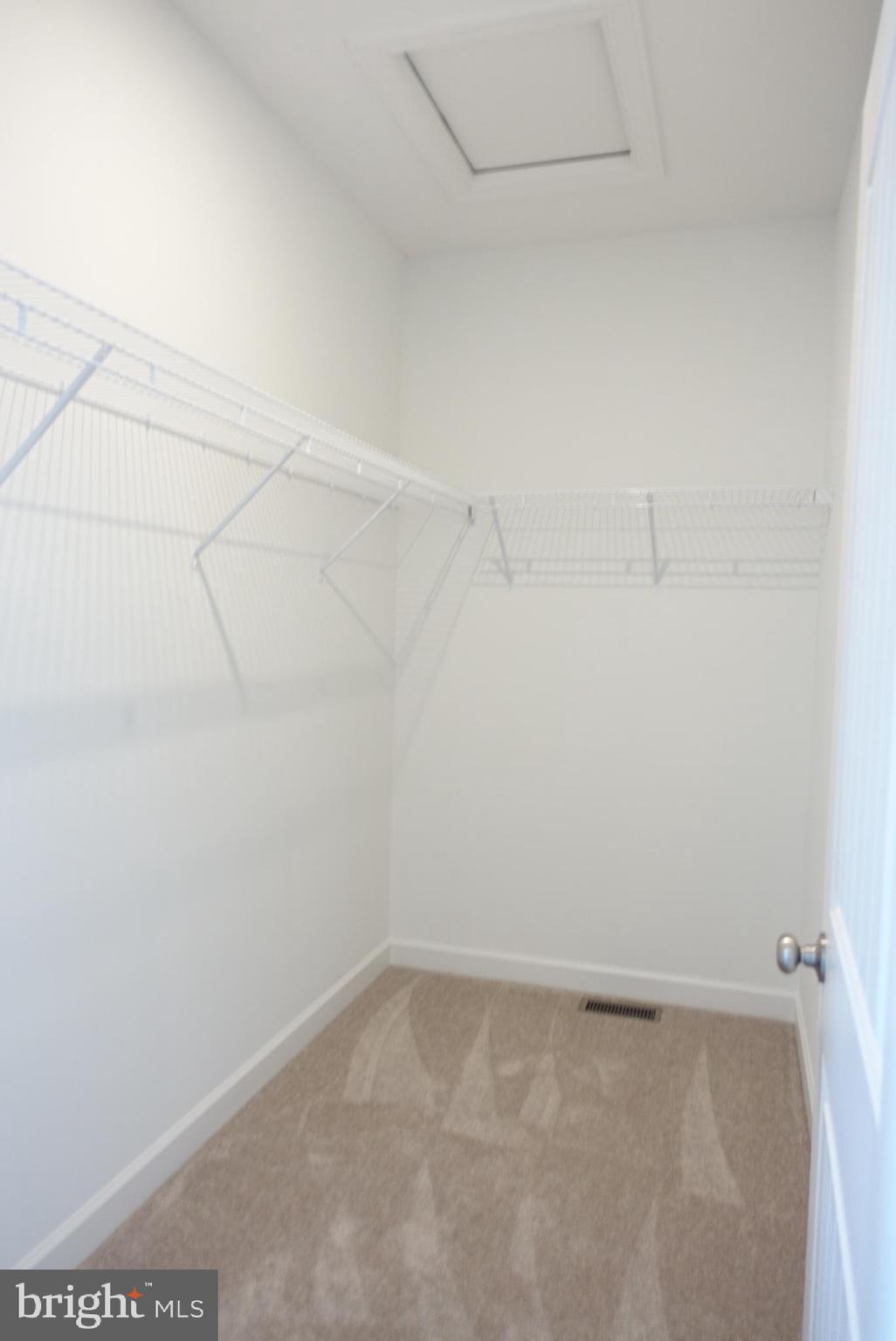 201 Kinneman Road, Unit 25 Abbottstown, PA 17301 - Photo 19 of 32 a view of a room with racks on the wall