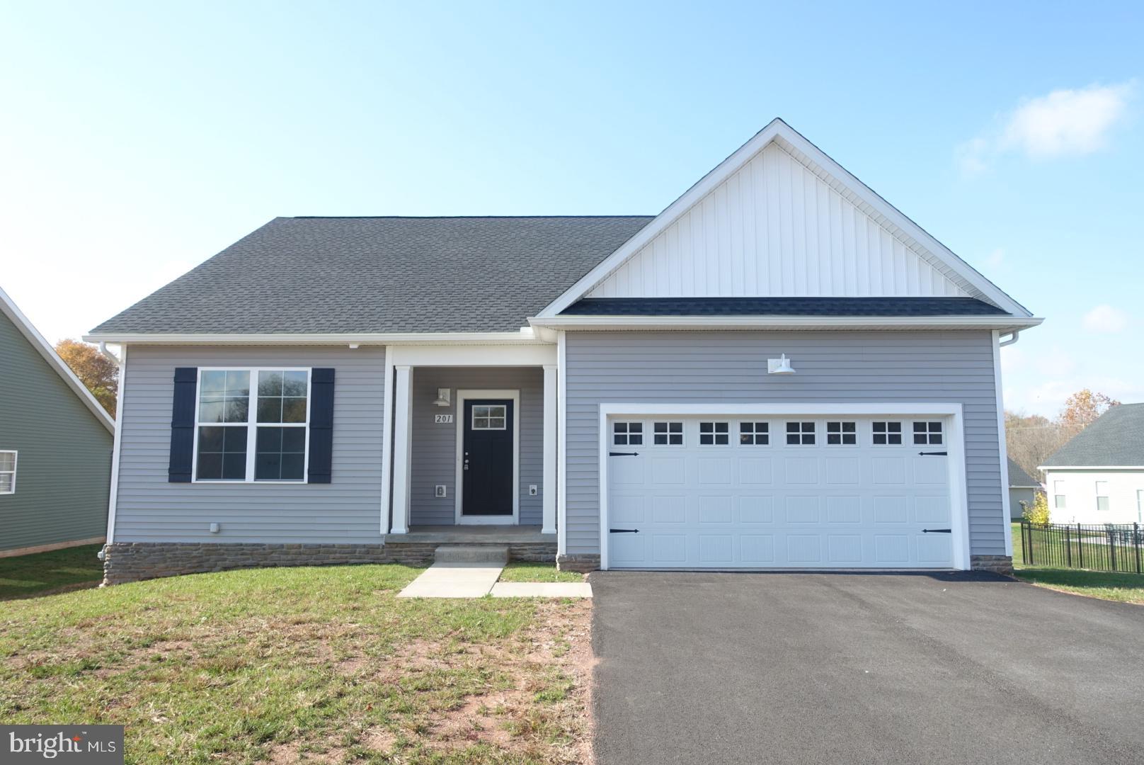 201 Kinneman Road, Unit 25 Abbottstown, PA 17301 - Photo 2 of 32 a view of an house with backyard space and balcony