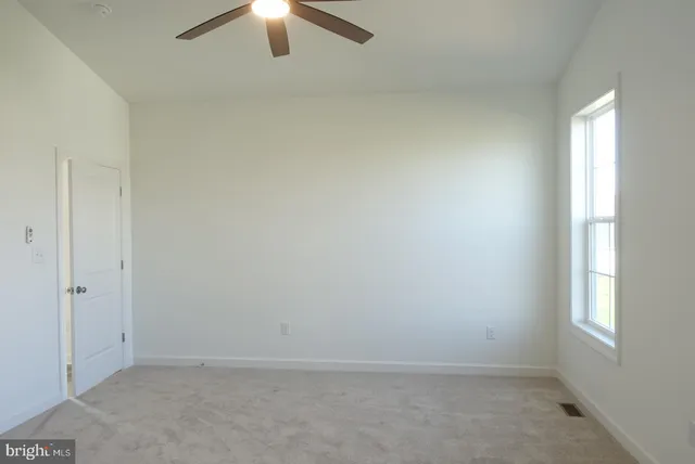 a view of a glass door with a balcony