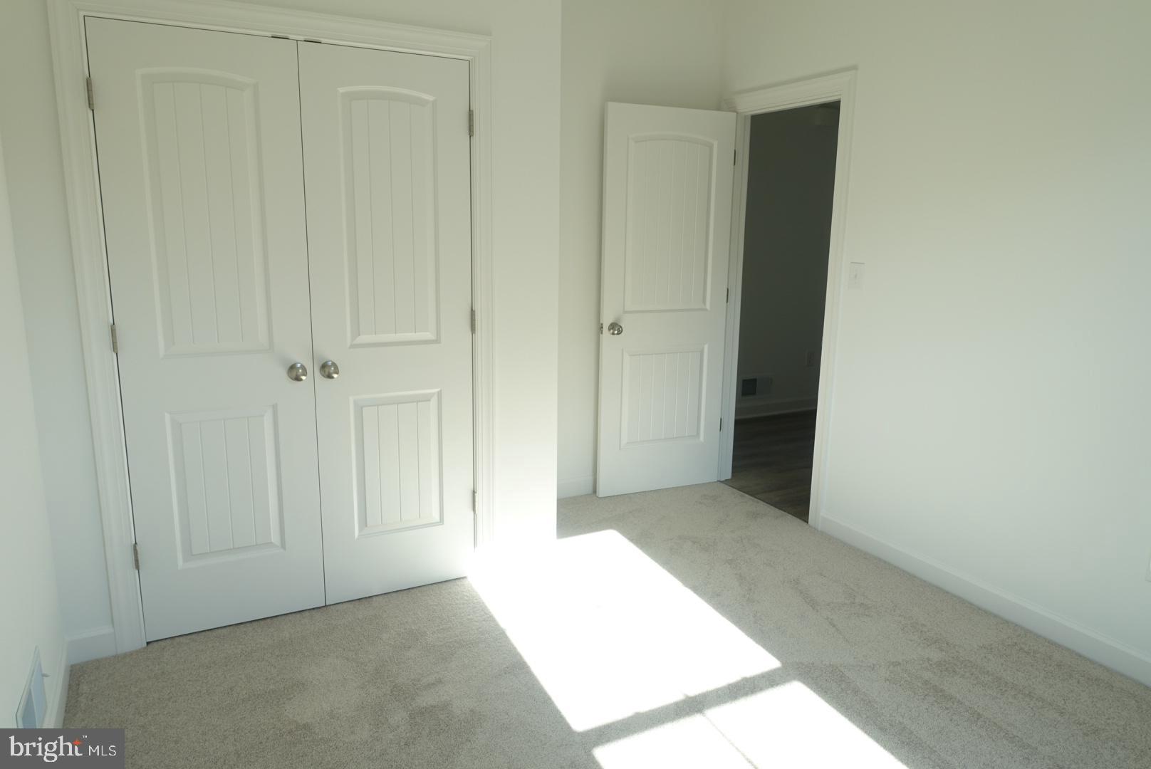 201 Kinneman Road, Unit 25 Abbottstown, PA 17301 - Photo 10 of 32 a view of hallway with closet