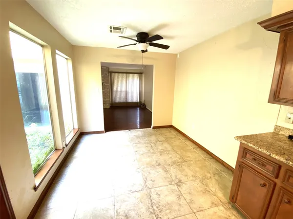 a view of a bathroom sink and a mirror