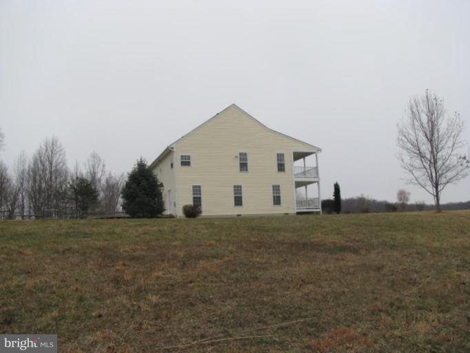 5979 Free State Road Marshall, VA 20115 - Photo 22 of 30 a view of white house with a big yard