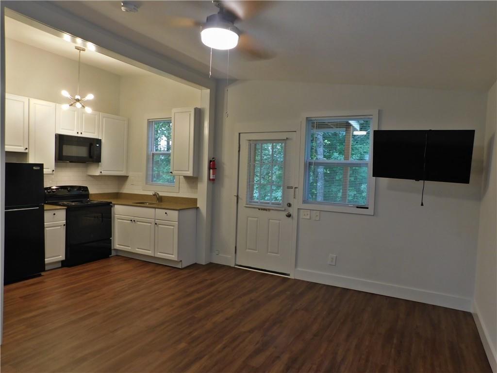 2331 Highway 52 Dahlonega, GA 30533 - Photo 2 of 5 a kitchen with a sink and a stove top oven