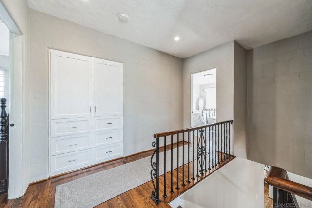 a view of a hallway with closet