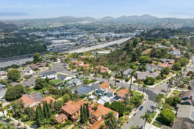 an aerial view of residential house with outdoor space