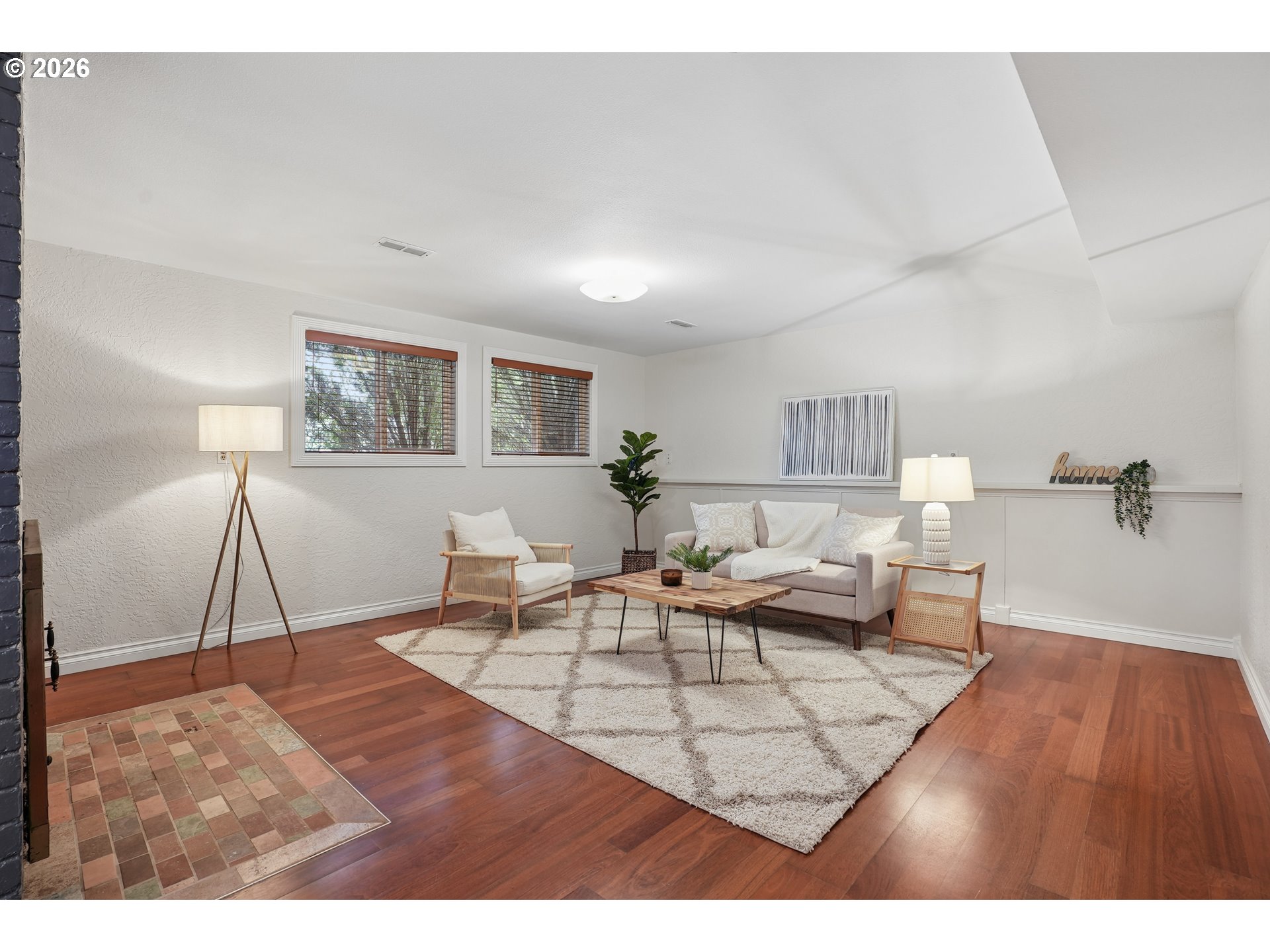 992 South South End Road Oregon City, OR 97045 - Photo 26 of 38 a living room with furniture and a wooden floor